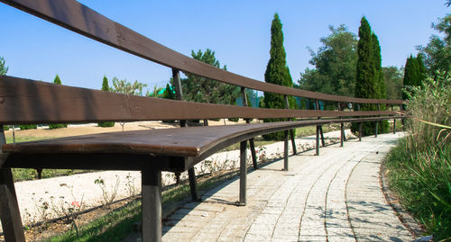 Footbridge against clear sky