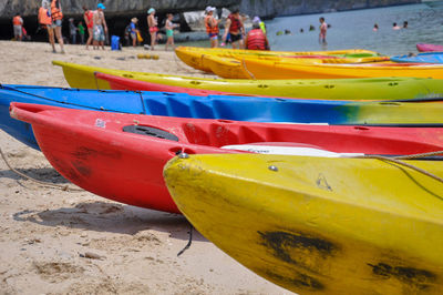 Boats moored on beach