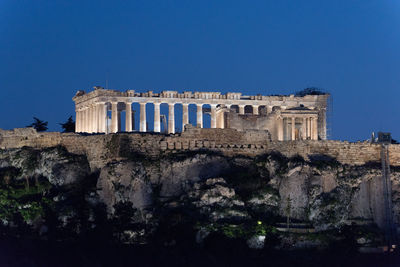 Acropolis low angle view of historical building against clear sky