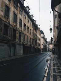 Road leading towards buildings