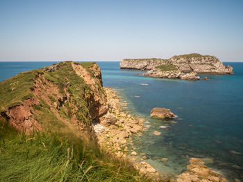 Scenic view of sea against clear sky