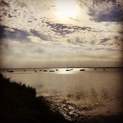 Scenic view of sea against sky at sunset