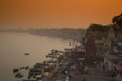 Sunset at waterside of ganga river in varanasi 