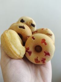 Close-up of hand holding cookies