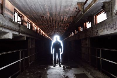 Full length of woman in tunnel