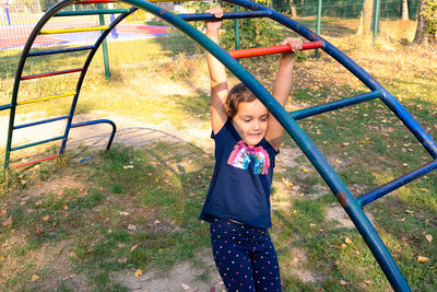 High angle view of girl playing in playground