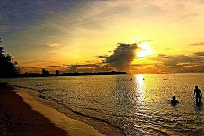 Scenic view of sea at sunset