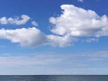 Scenic view of seascape against cloudy sky