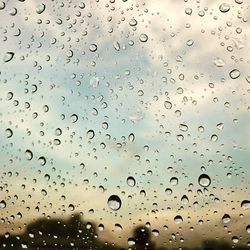 Close-up of water drops on table