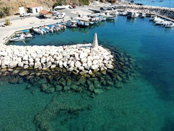 High angle view of sailboats in sea