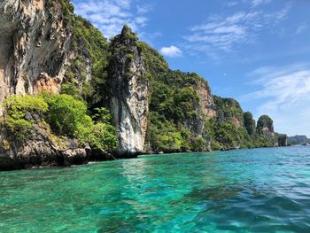 Scenic view of sea and rocks against sky