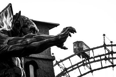 Low angle view of statue against clear sky