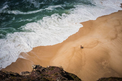 High angle view of waves at beach