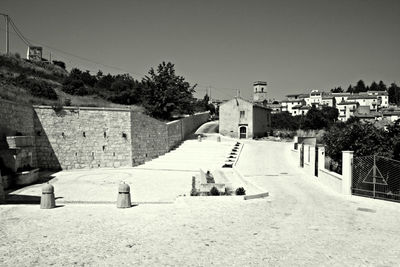 Houses and buildings against sky