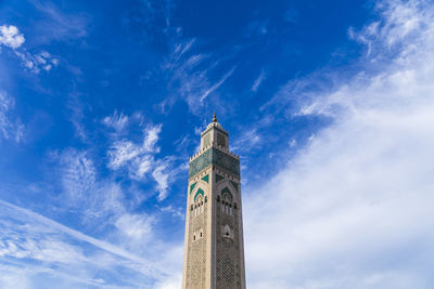 Low angle view of clock tower against sky