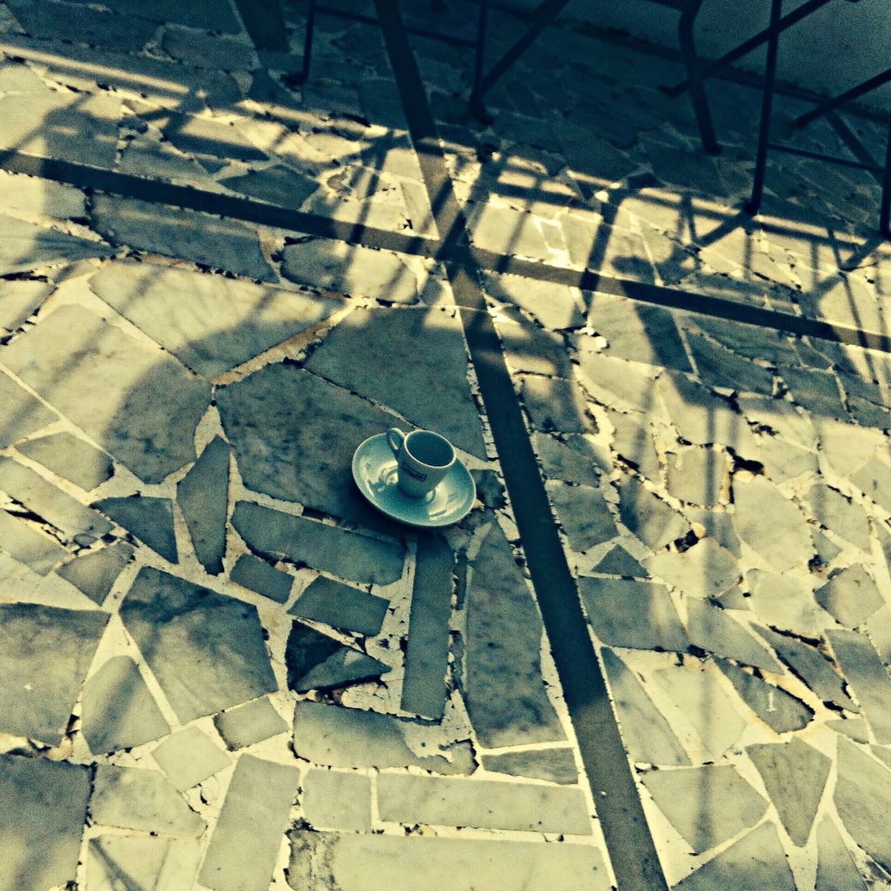high angle view, pattern, metal, full frame, old, built structure, no people, abandoned, backgrounds, day, damaged, outdoors, sunlight, close-up, geometric shape, obsolete, cobblestone, metallic, deterioration, weathered