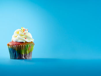 View of cupcakes against blue background