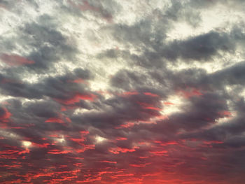 Low angle view of dramatic sky during sunset