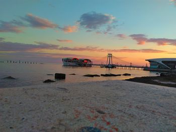 Scenic view of sea against cloudy sky