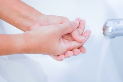 Close-up of hand holding hands