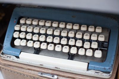 High angle view of old typewriter on table