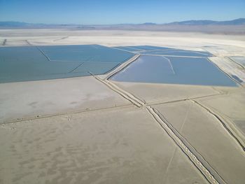 Aerial view of beach against sky