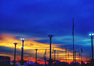 Street light against sky at dusk