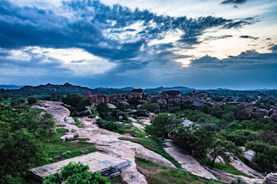 Scenic view of landscape against cloudy sky