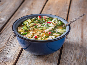 High angle view of vegetable soup in bowl on table