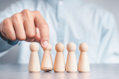 Close-up of hands on table