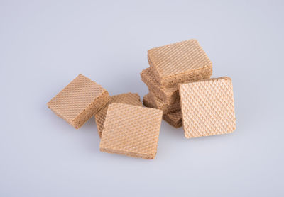 High angle view of bread against white background