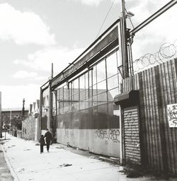 Built structure against cloudy sky