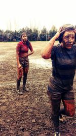 Full length of woman standing on field