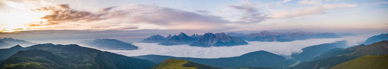 Panoramic view of mountains against sky during sunset