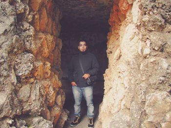 Man standing in tunnel