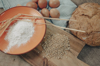 Bread dough with eggs and ingredients to make traditional rustic bread.