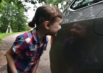 Rear view of people in car