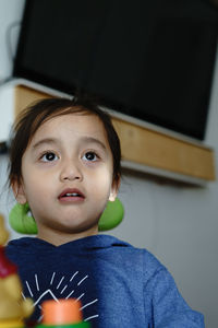 Portrait of cute boy at home