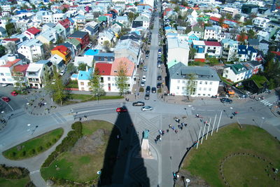 High angle view of people walking on road in town