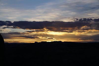 Scenic view of dramatic sky during sunset