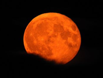 Scenic view of moon against sky at night