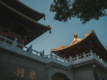 Low angle view of temple building against sky