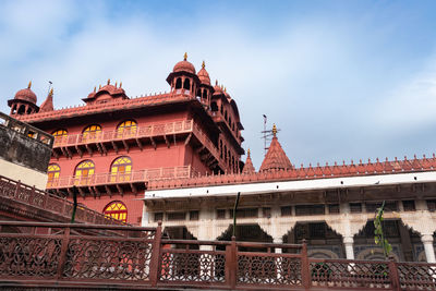 Ancient artistic holy jain temple entrance with cloudy sky at morning