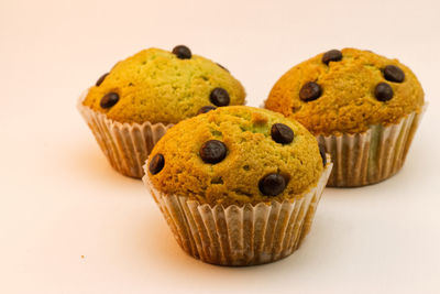 Close-up of cookies against white background