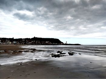 Scenic view of beach against sky