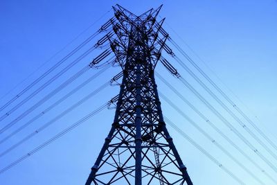 Low angle view of electricity pylon