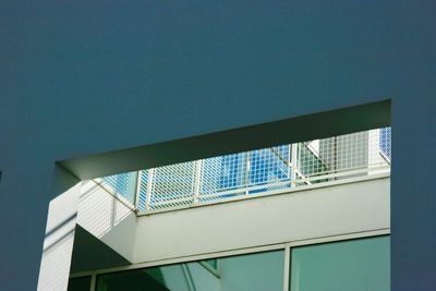 Low angle view of building against clear blue sky