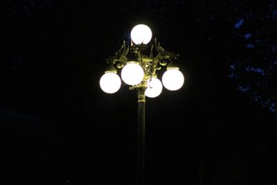 Low angle view of illuminated street light