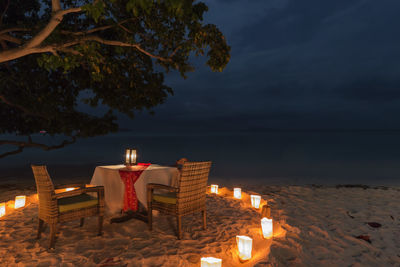 Romantic dinner on a beach of phi phi don island in krabi, thailand