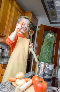 Midsection of man preparing food at home